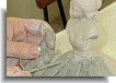 Lavorazione della porcellana con tulle o pizzo